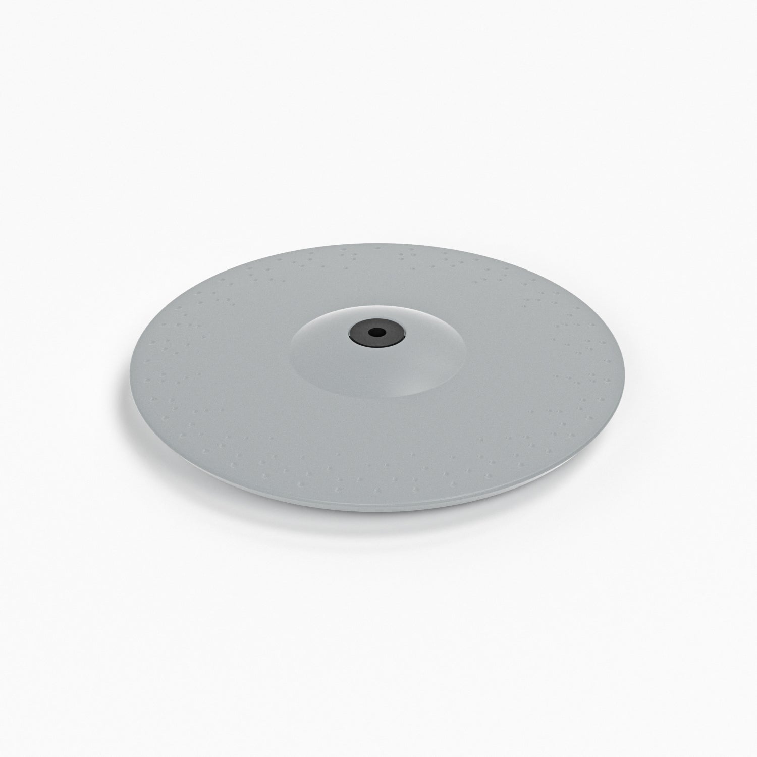A circular gray textured plate or lid with a small black center hole, shown on a clean white background.