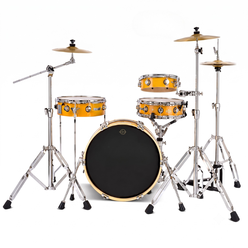 A complete drum kit with a black front drum head, yellow-orange shell finish, and silver chrome hardware, displayed on a clean white background.