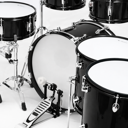 Black drum set on a white background